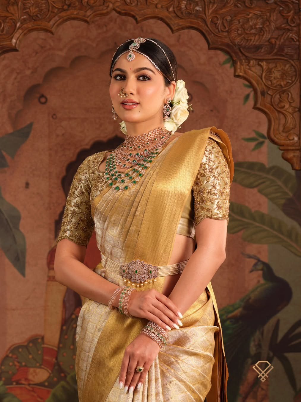 A model wearing layered 18K gold jewellery — the house at AGN Gold & Diamonds, Thrissur